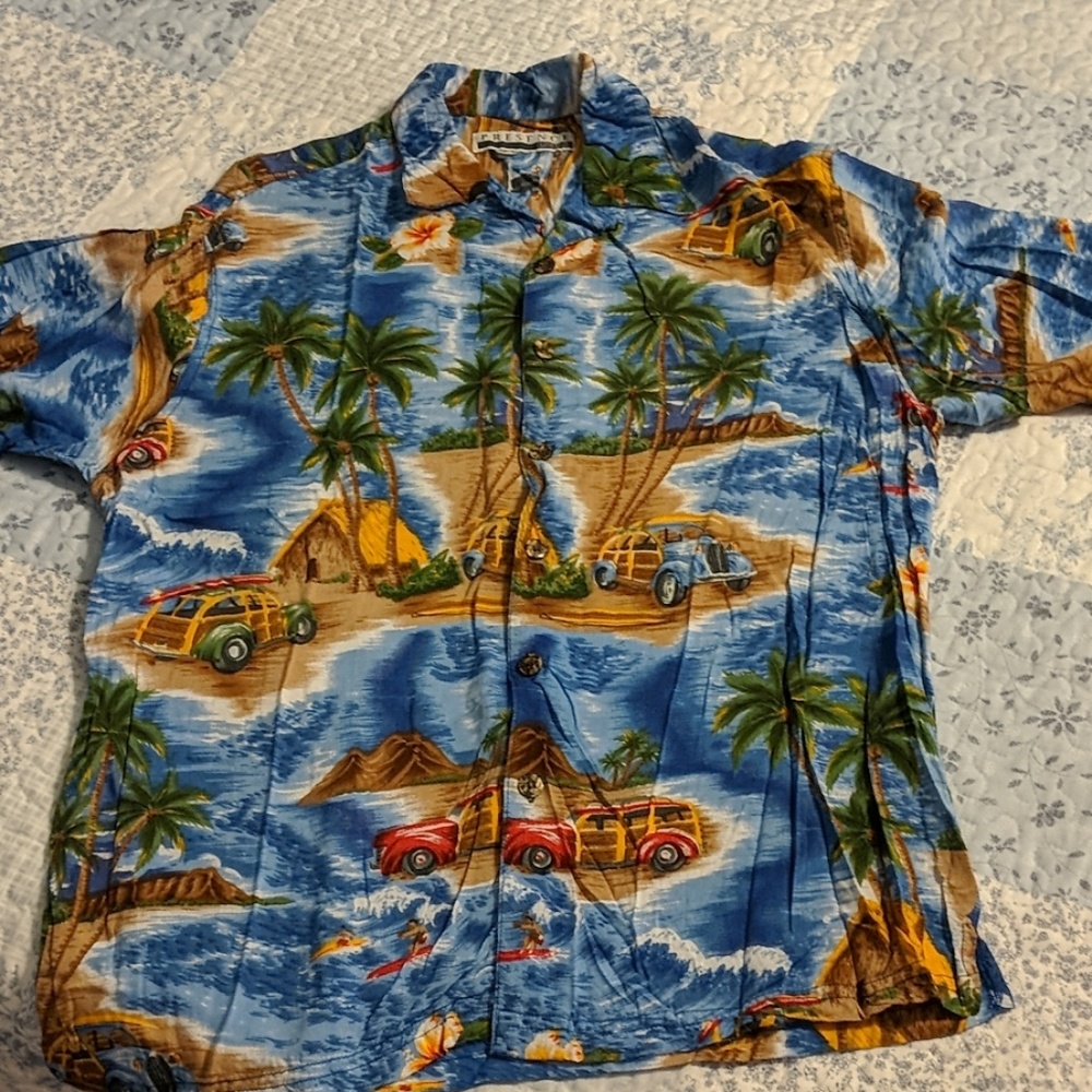 Tropical print button up shirt.